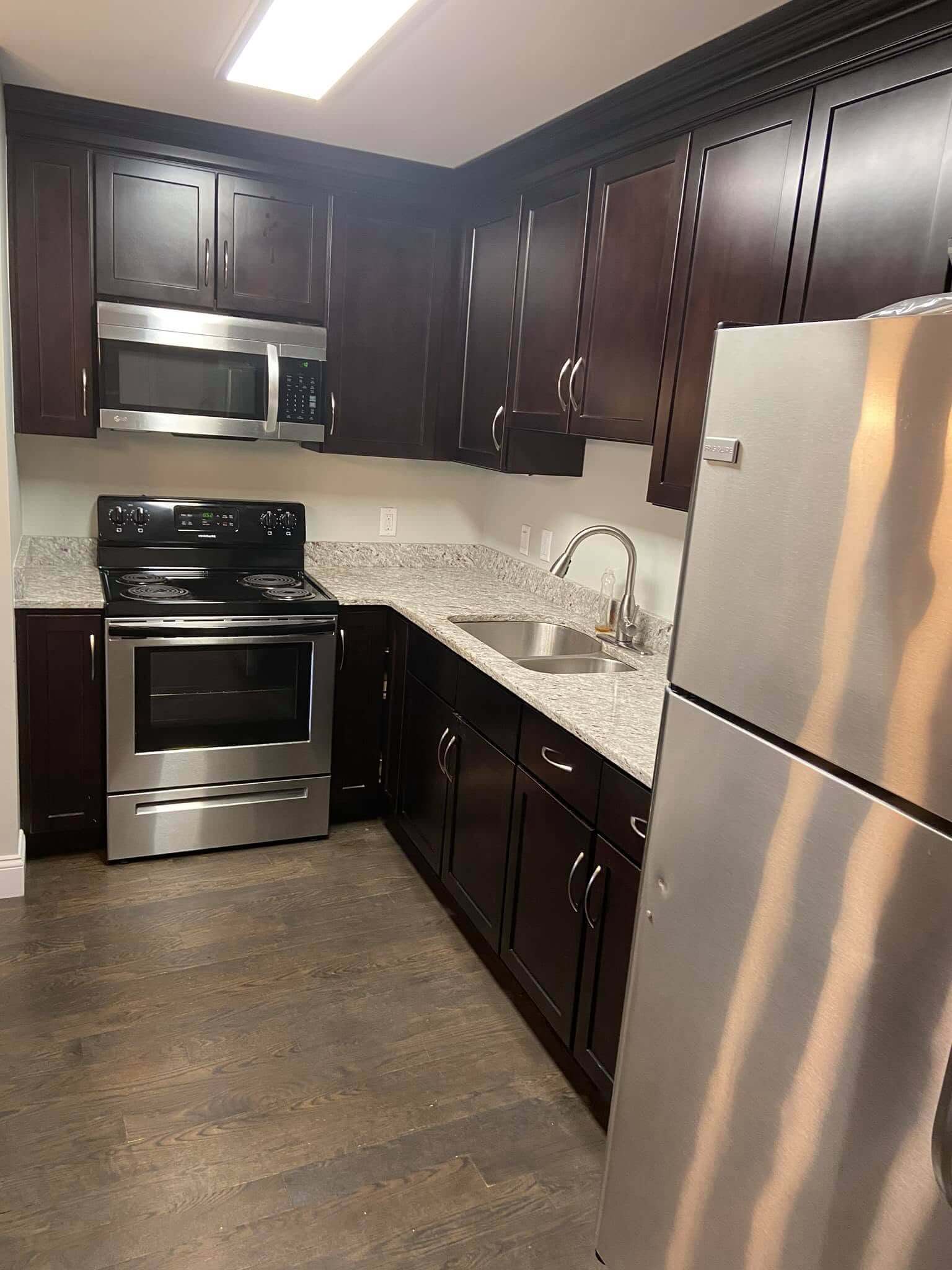 Kitchen cabinet painting and flooring project
